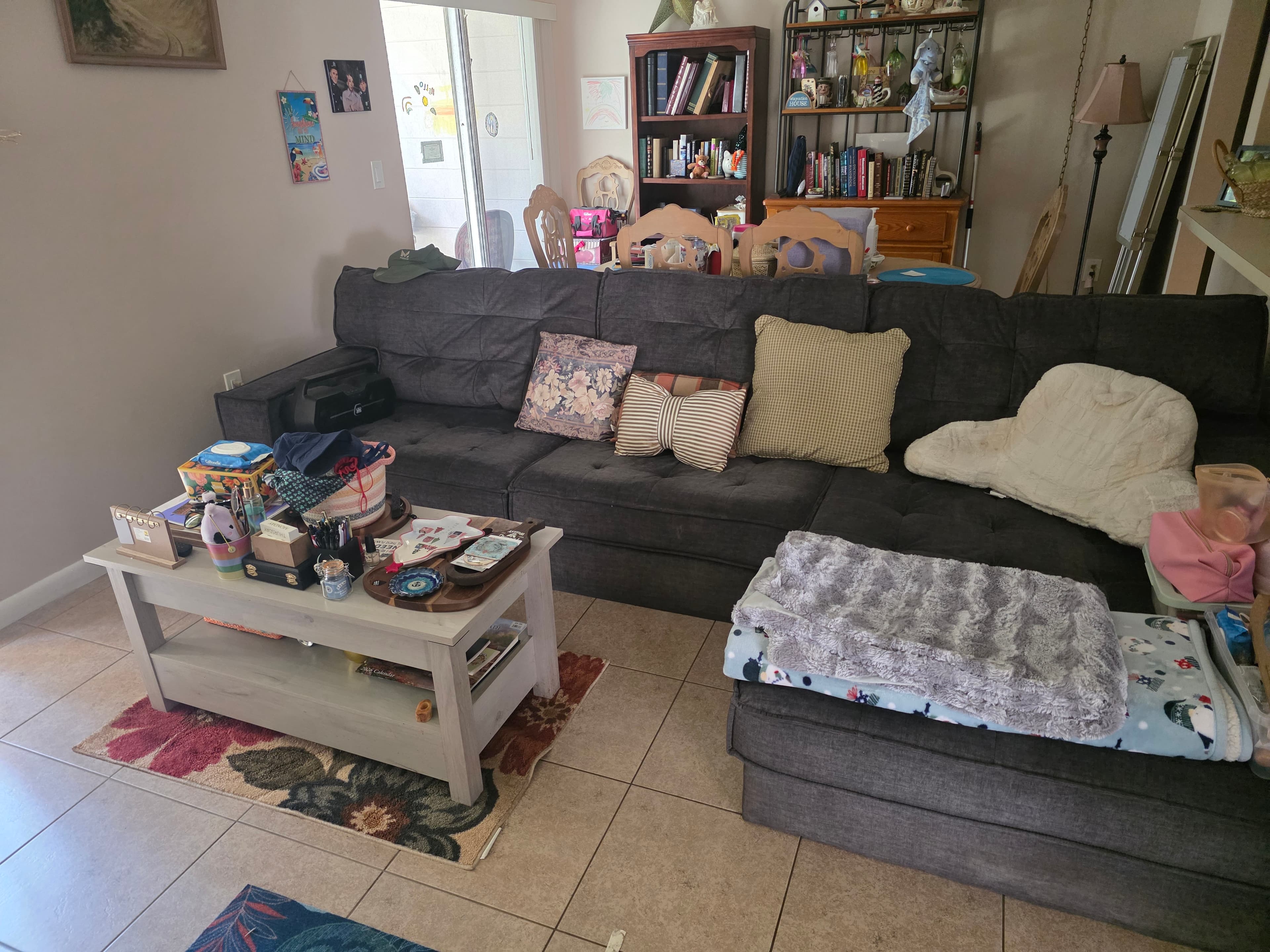 The same living room fresh and orderly after the Select crew finished